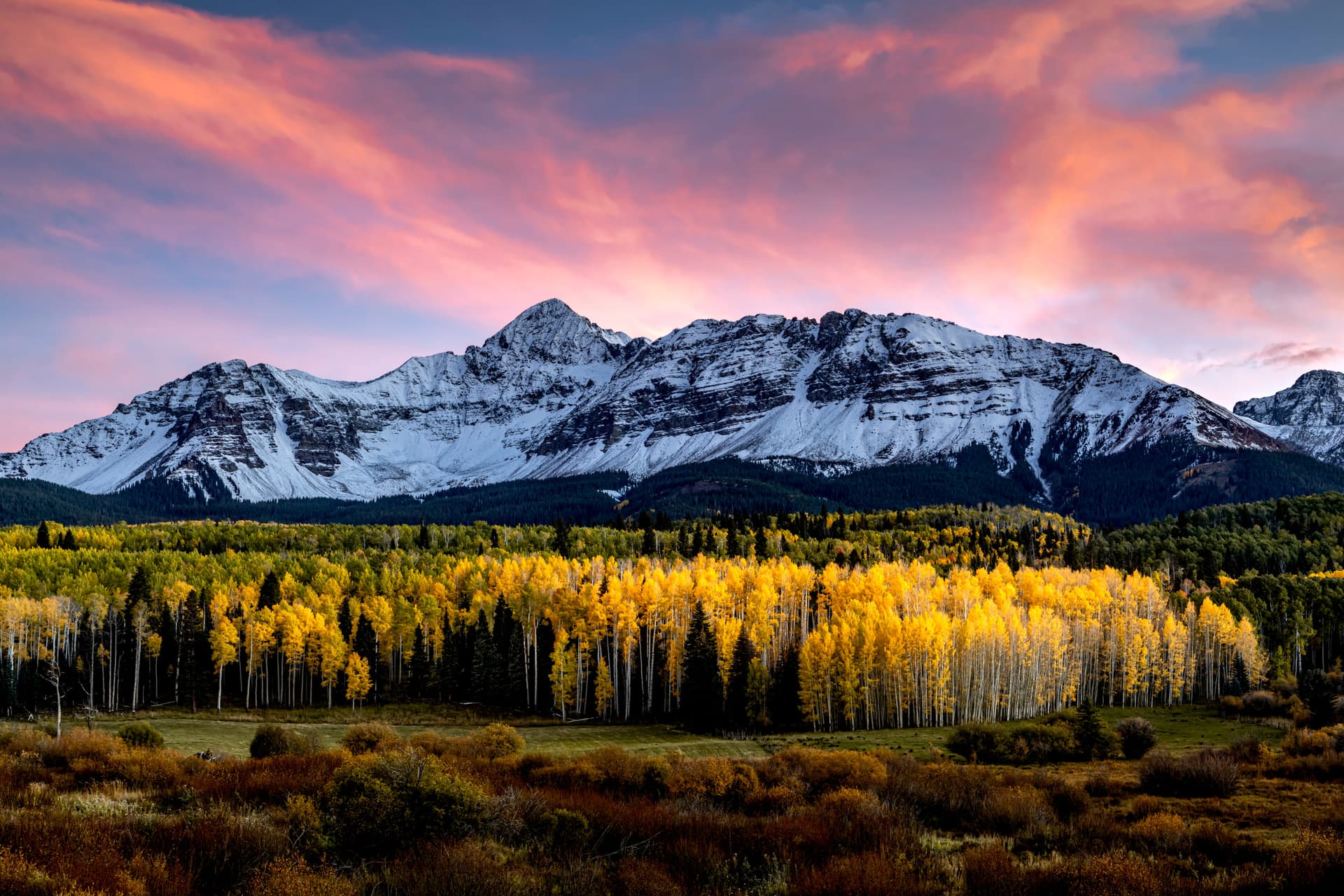 Wilson Mesa at sunset with alpenglow on the high San Juan ridgeline.