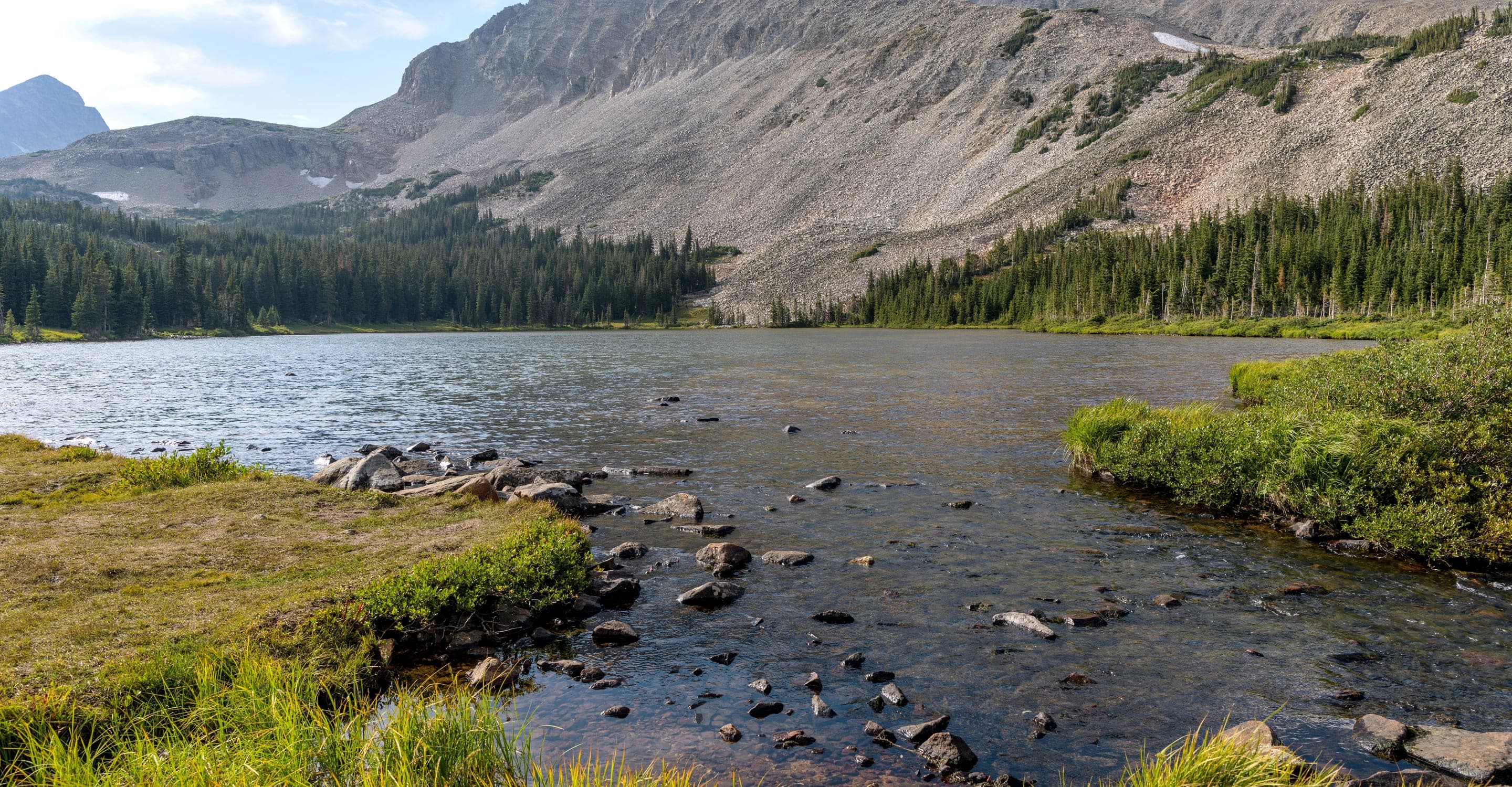 Mitchell Lake's tundra shoreline on the approach to Pawnee Pass.
